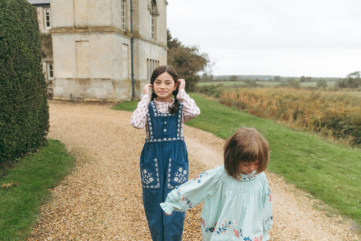 LALi / Clara Romper in Bijou Blue Embroidery